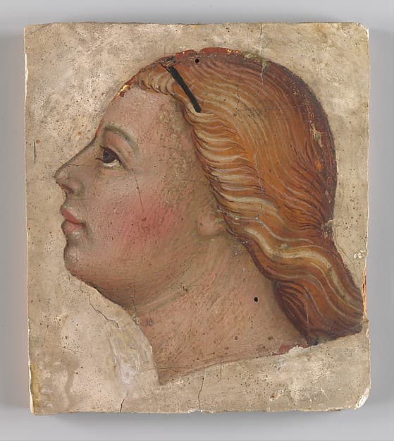 Artwork of Head of an Angel in Left Profile